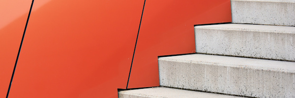 Stairs against an orange background