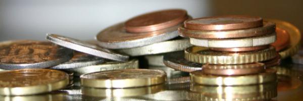 a pile of coins of different denominations